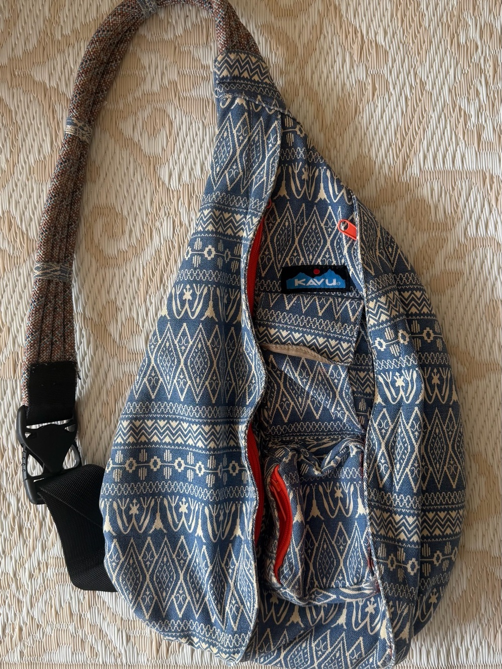 Kavu Blue Tribal Patter and Neon Coral Accents - Sling Backpack